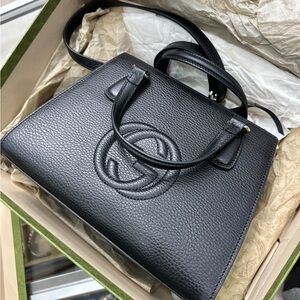 Brand new Gucci bag with tags in it never worn box included